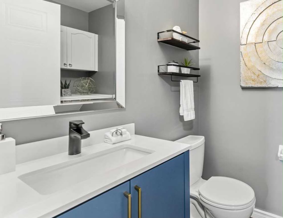 Blue vanity and white surface